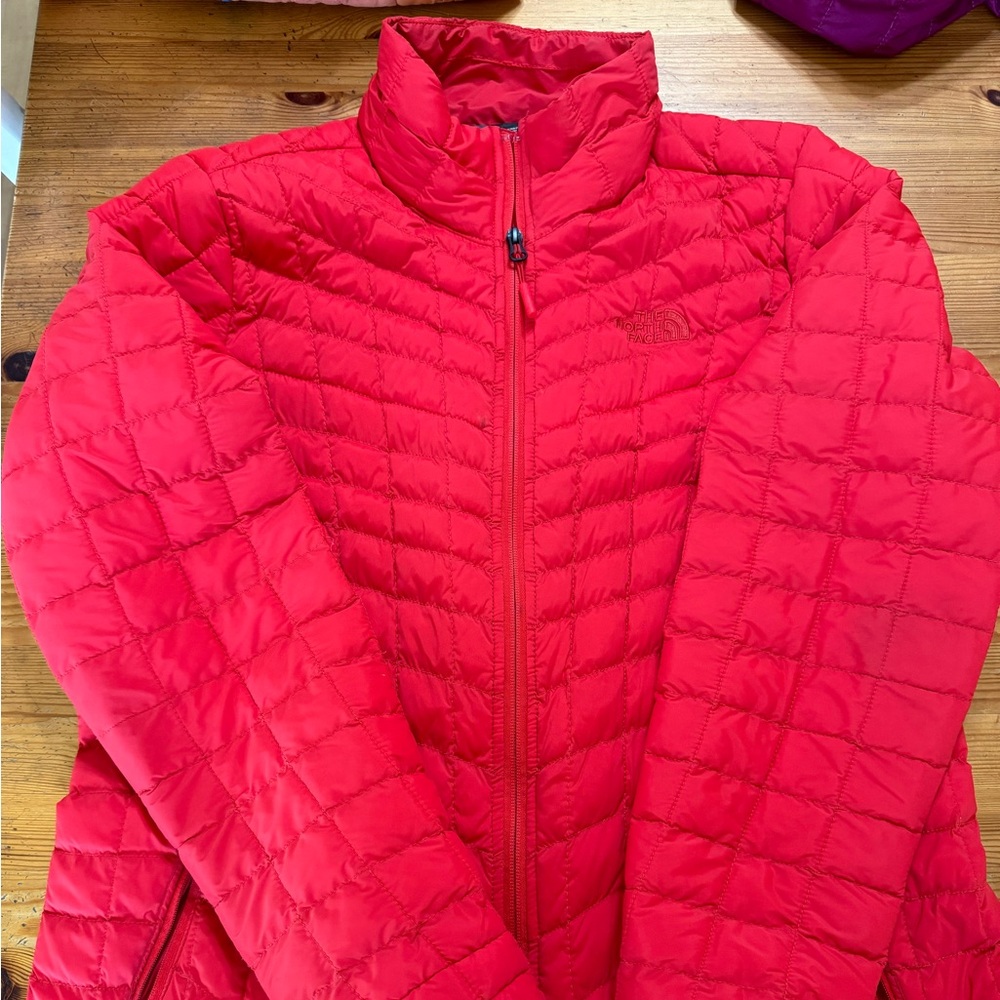 Women’s The North Face XL dark orange puffy jacket